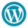 WordPress logo featuring a stylized white 'W' in a circle, set against a blue background. The design is simple and symbolizes website creation.