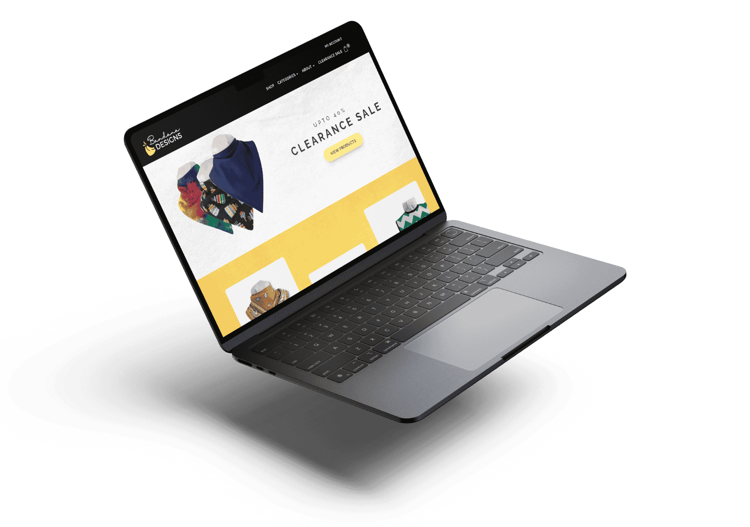 Laptop displaying a colorful website offering a "Clearance Sale" with up to 40% off. Vibrant bandanas showcased, creating a lively, inviting tone.