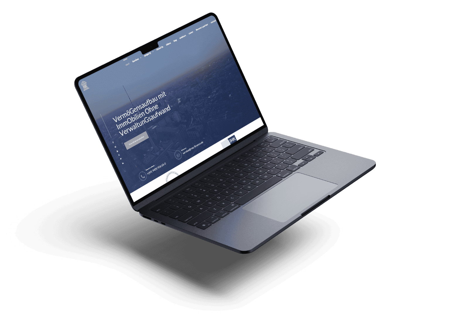 A sleek open laptop displaying a German real estate website. The screen shows a cityscape background with text about property investment. Modern and professional.