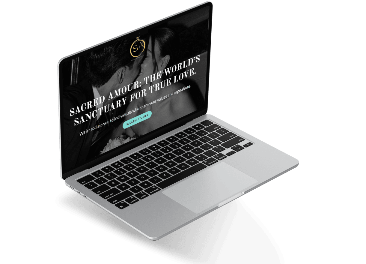 Laptop showing the Sacred Amour homepage with a black-and-white couple hero image and bold headline.
